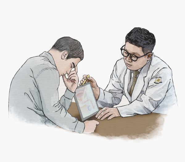 골드만 서울역 김태헌 원장이 환자와 상담하는 장면